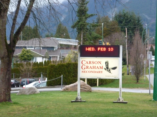 new sign in front of school
